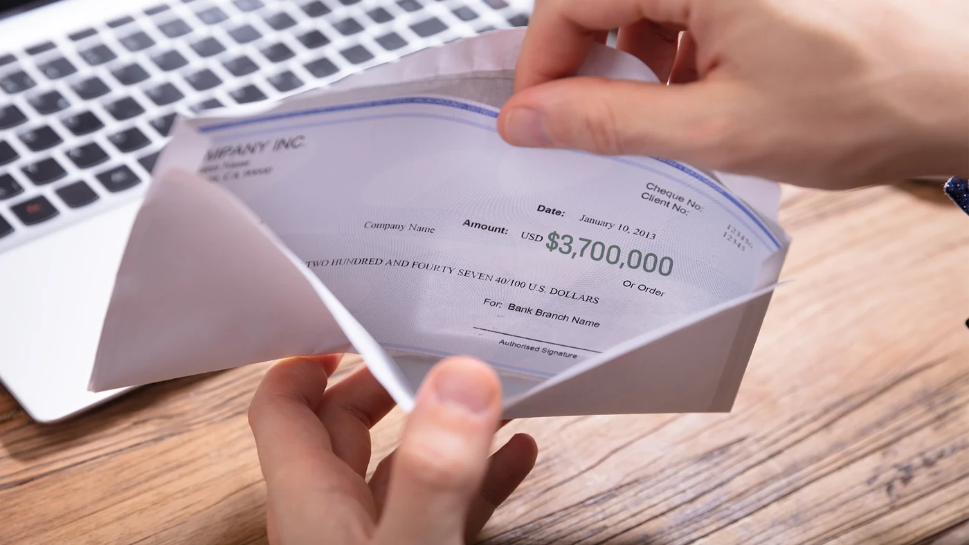 A check written out for $3,700,000