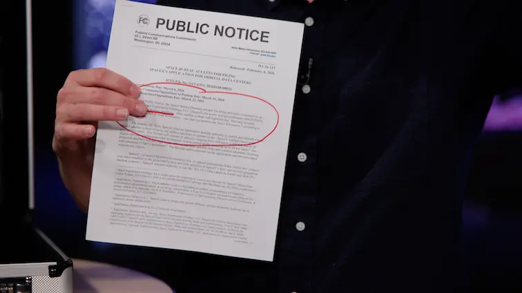 James Altucher with a document Elon filed with the FCC