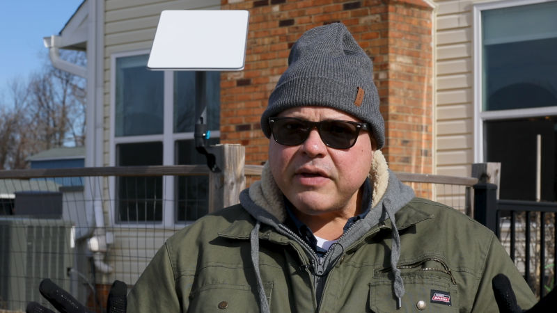 Photo of Ray Blanco outside house